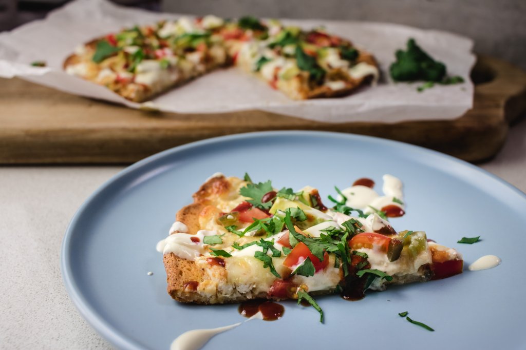 Missing pizza on your ketogenic diet? This keto chicken pizza will statisfy your pizza craving. It uses the ever popular fat head dough and is a winner.
