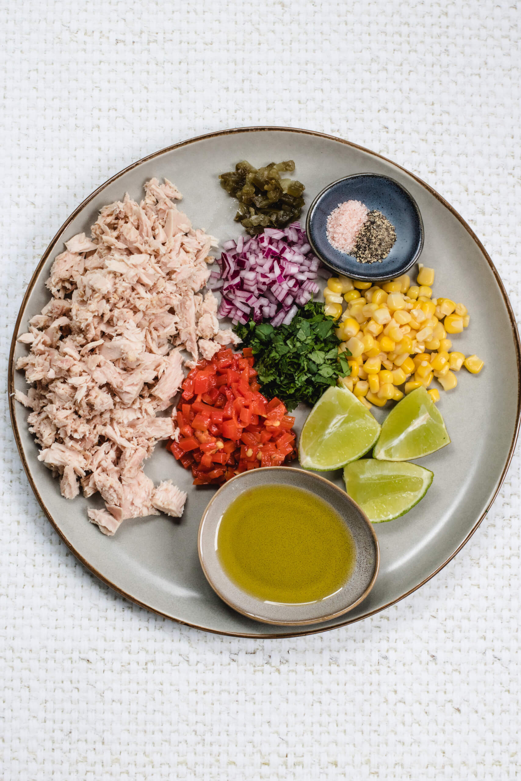 Mexican tuna salad ingredients on a plate. 