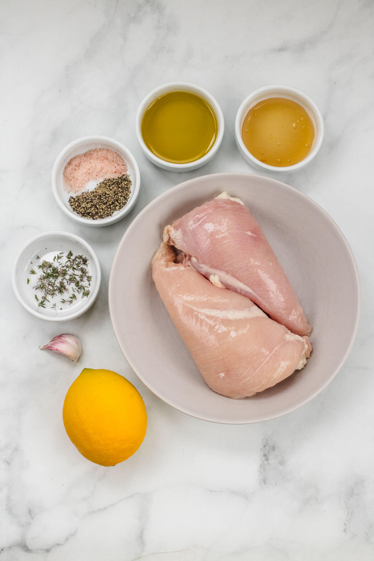 Ingredients to make lemon chicken marinade laid out.